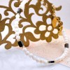 Handmade lucky bracelet made of Mother of pearl, hematite and gold-plated metal parts