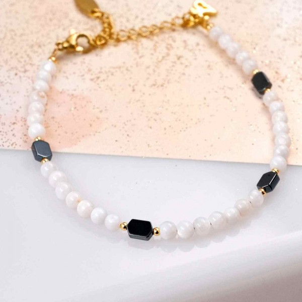 Handmade lucky bracelet made of Mother of pearl, hematite and gold-plated metal parts