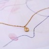 Short necklace of stainless steel with gold-plated metal parts